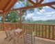 Chairs on the deck of the Time Well Wasted 1-bedroom cabins in the Smoky Mountains.