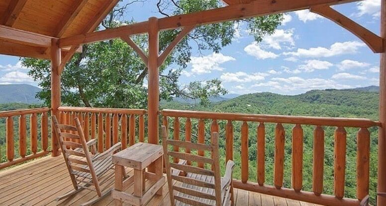 Chairs on the deck of the Time Well Wasted 1-bedroom cabins in the Smoky Mountains.